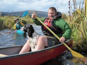 Coordinator Glen Riley and his conservation dog Pipi check out the waterways at the Sinclair Wetlands (South Otago).