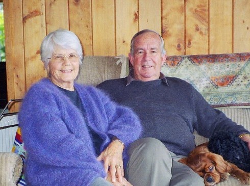 Lois and Warren sat together on a couch.