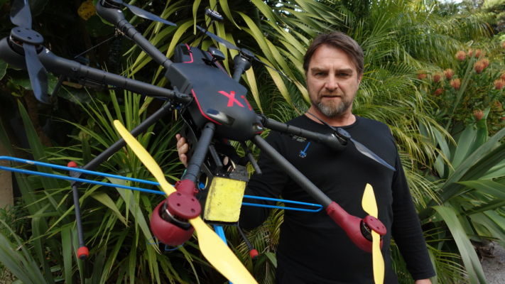 Philip Solaris of X-craft holds one of his remote-controlled drones. Drones can carry various types of sensors or cameras to gather information and the technology is improving rapidly.