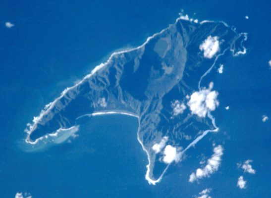 Raoul Island (photographed from space) where rats have been eradicated, in spite of suggestions of resistance to anticoagulant toxins. Image credit: NASA (Wikimedia Commons).