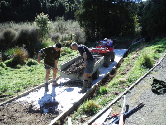 Volunteers, Alan Rogers and Graeme Pitman work on walkway upgrades.