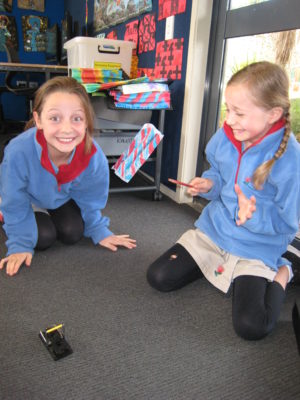Liana and Kaeli practise with the traps.