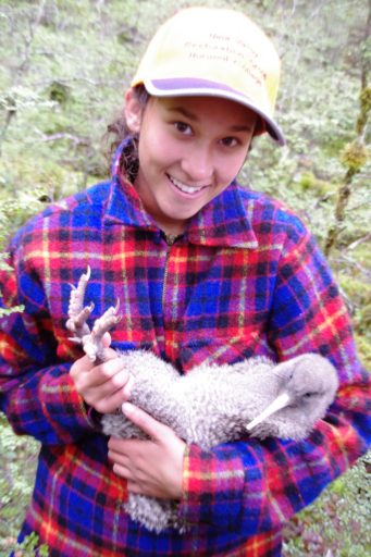 Hurunui student Anna Clark shows how to hold a kiwi securely.