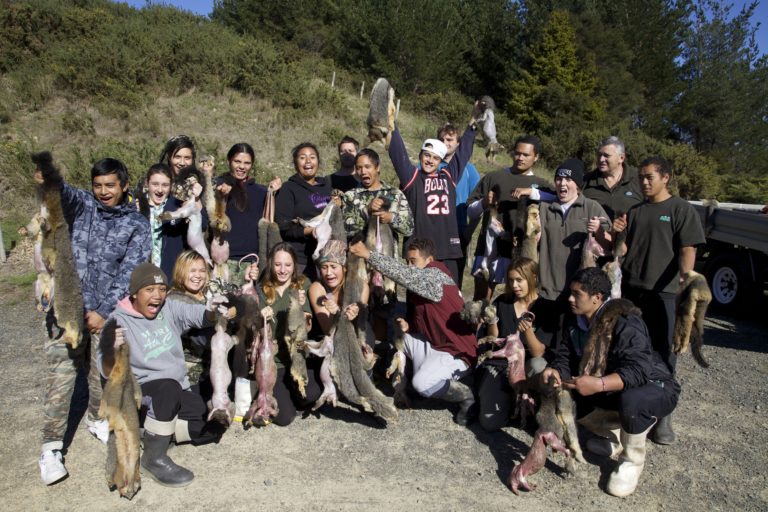 Predator eradication represents signiﬁcant gains and opportunities for Māori.  Huntly students at a recent possum trapping course.