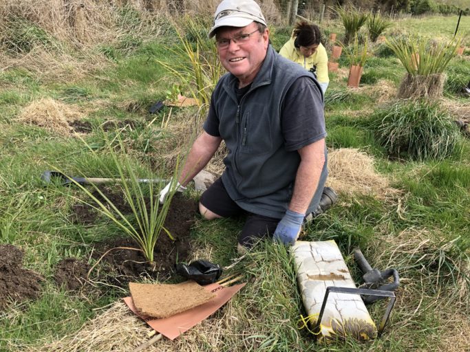 A volunteer planting at YEPT Tavora Reserve. Photo: YEPT.