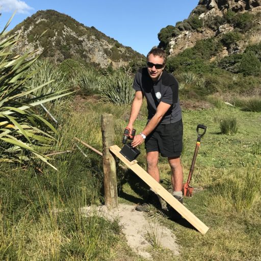 Ben Goldsworthy - YEPT Ranger installing Steve Allen trap at YEPT Okia Reserve.