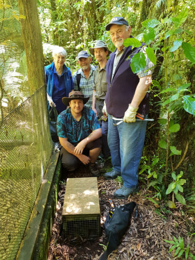 Good keen volunteers doing the rounds of some traps at Pukaha. Image credit: John Bissell.