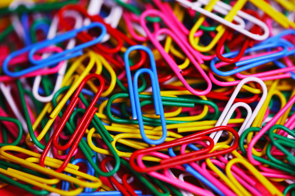 Colorful assortment of paper clips. Don't forget to include attachments in your funding application 