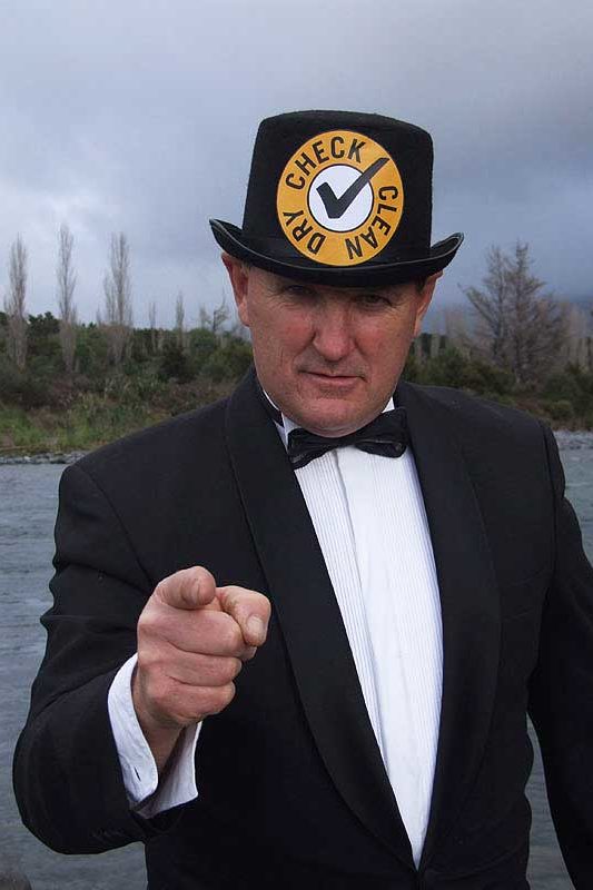 Dave Cade in a tux in front of a river wearing his "Check, Clean, Dry" hat