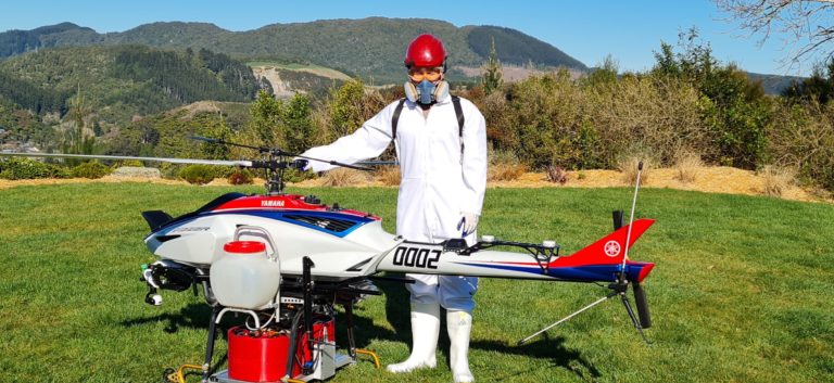 A technician preparing a drone.