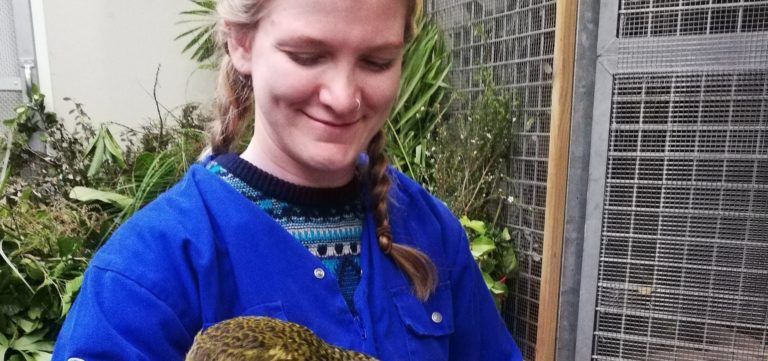 Sarah with a kākāpō