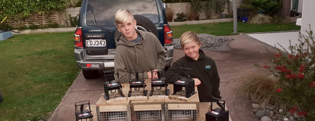 Brothers Daniel and Matthew Wilson with DOC 200s and SA2 traps