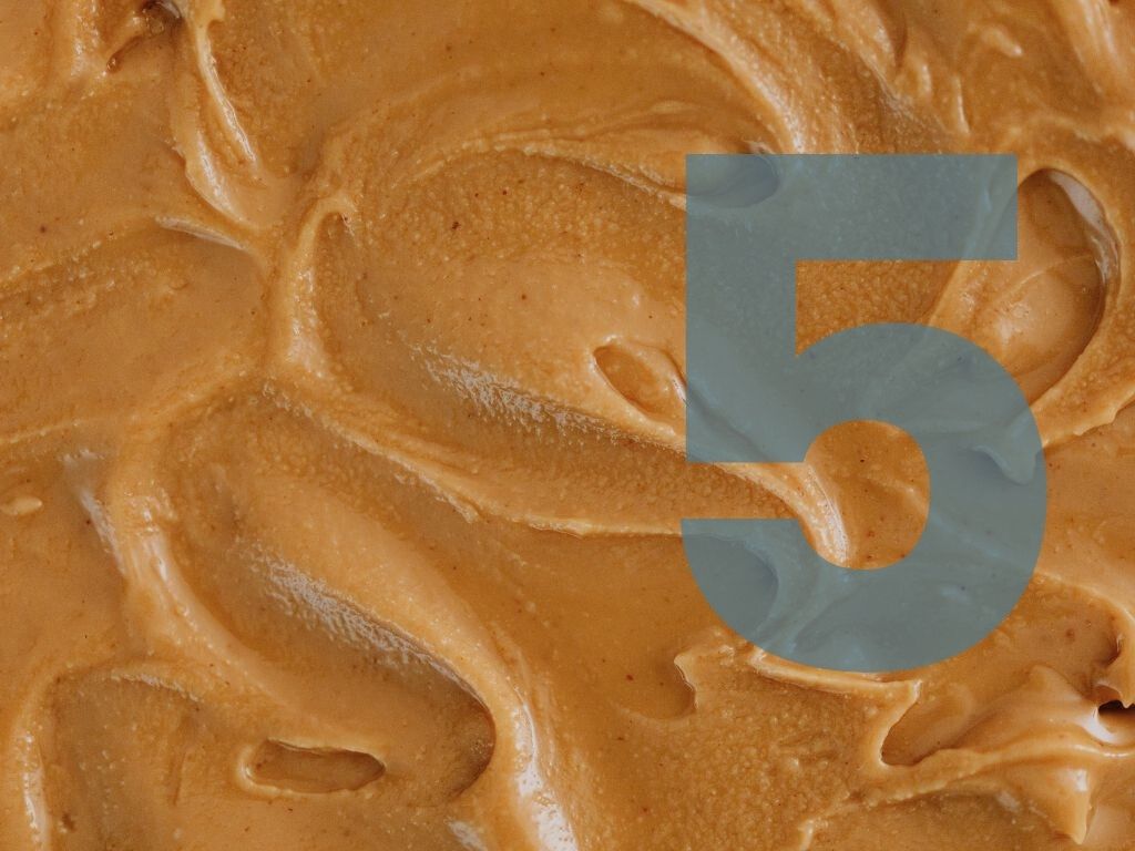 Smearing of peanut butter with a number 5 overlaid