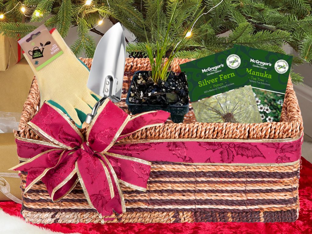 A gift box with gardening tools and native seeds and seedlings.