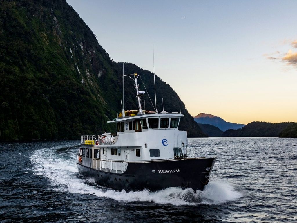 Flightless the Pure Salt charter boat that voyages through Fiordland National Park.