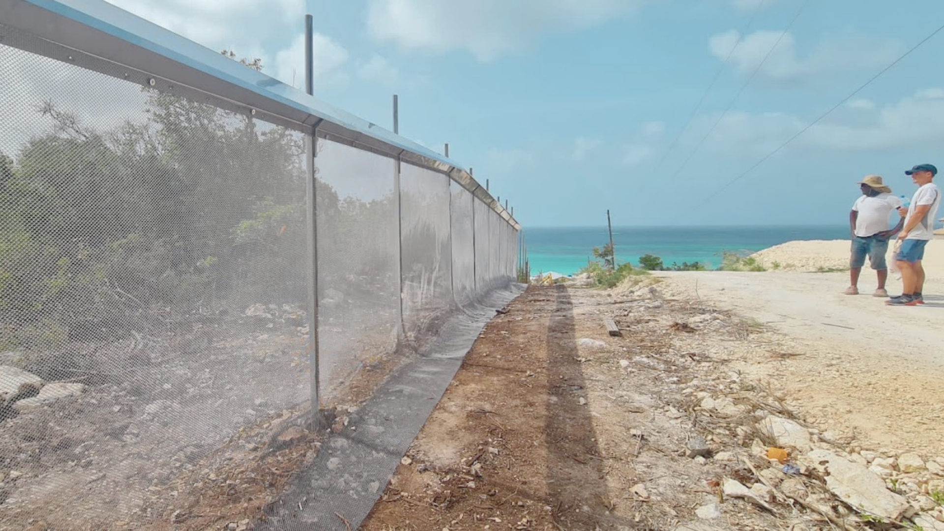 A predator proof fence on a tropical island