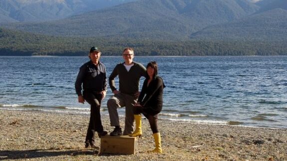 Paul, Johan and Joyca with a trap on Lake Te Anau.