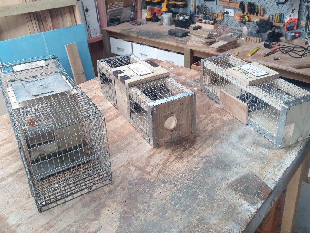 Cage traps in a workshop.