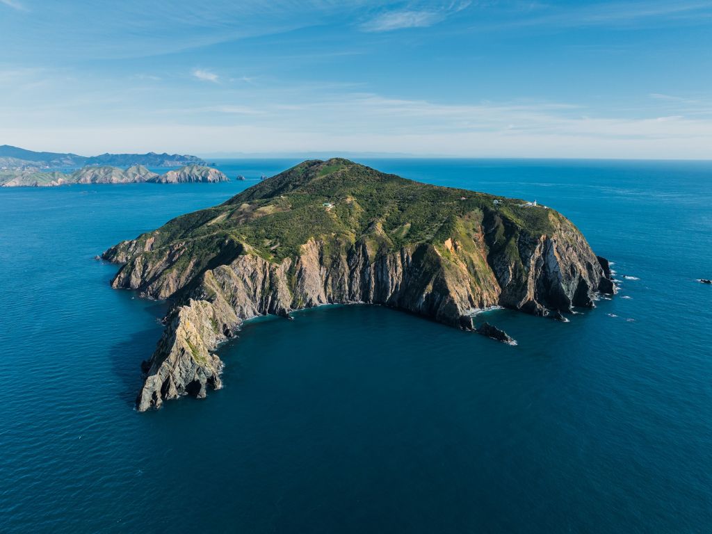 Photo of an island with steep cliffs